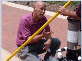 Tom Jones, Pool Weasel founder, working with the unit poolside