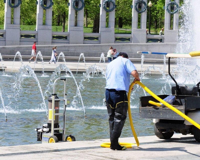Pool Weasel in use at the Rainbow Pool fountain, WWII Memorial, Washington DC